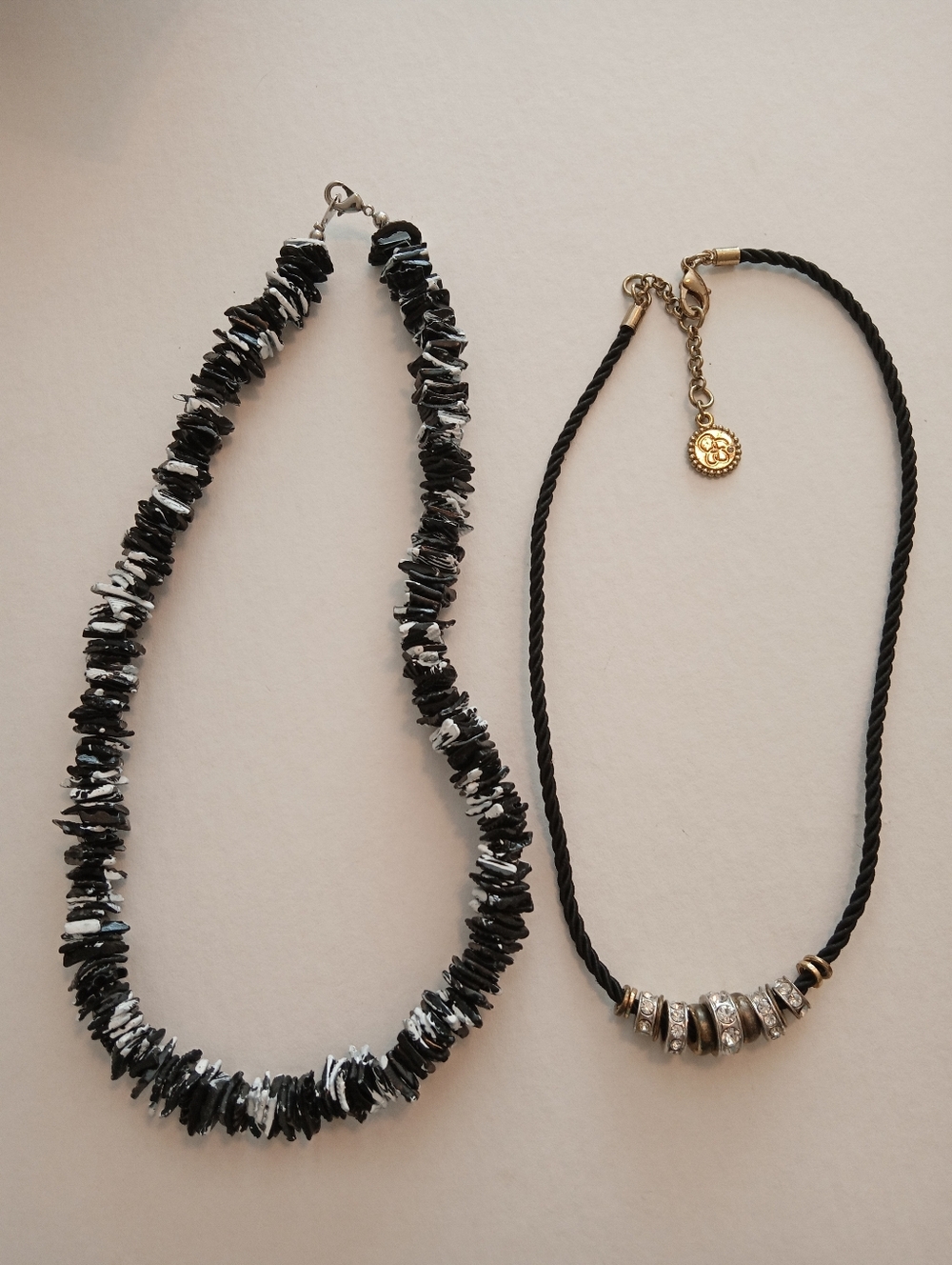 #1228.  2 Piece Black Shell & Rhinestone Jessica Simpson Necklace Bundle